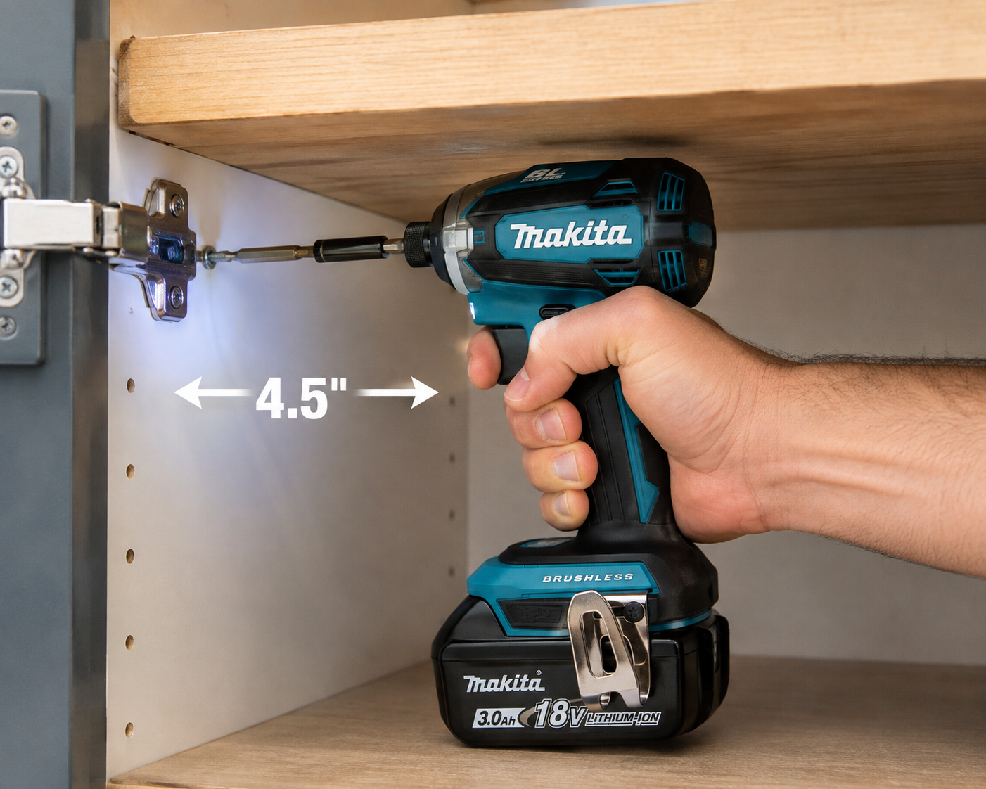 Makita XDT19Z compact 4.5-inch design used inside a cabinet