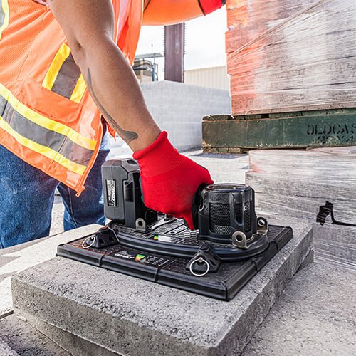 GRABO HighFlow plate placed on a concrete paver